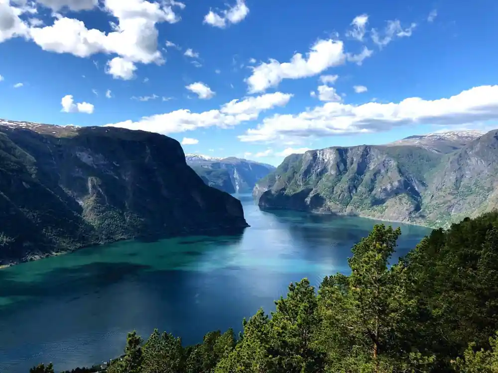 The Aurlandsfjord curving away between steep green walls