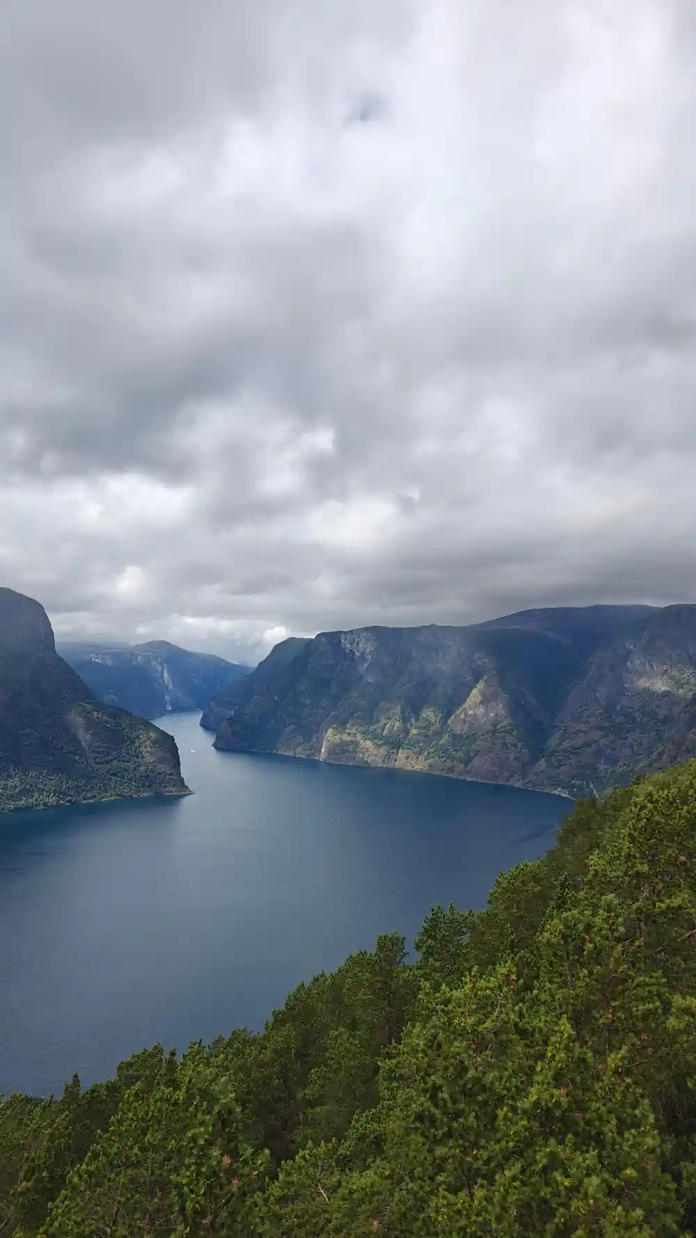 Grey cloud over a wide reach of the fjord